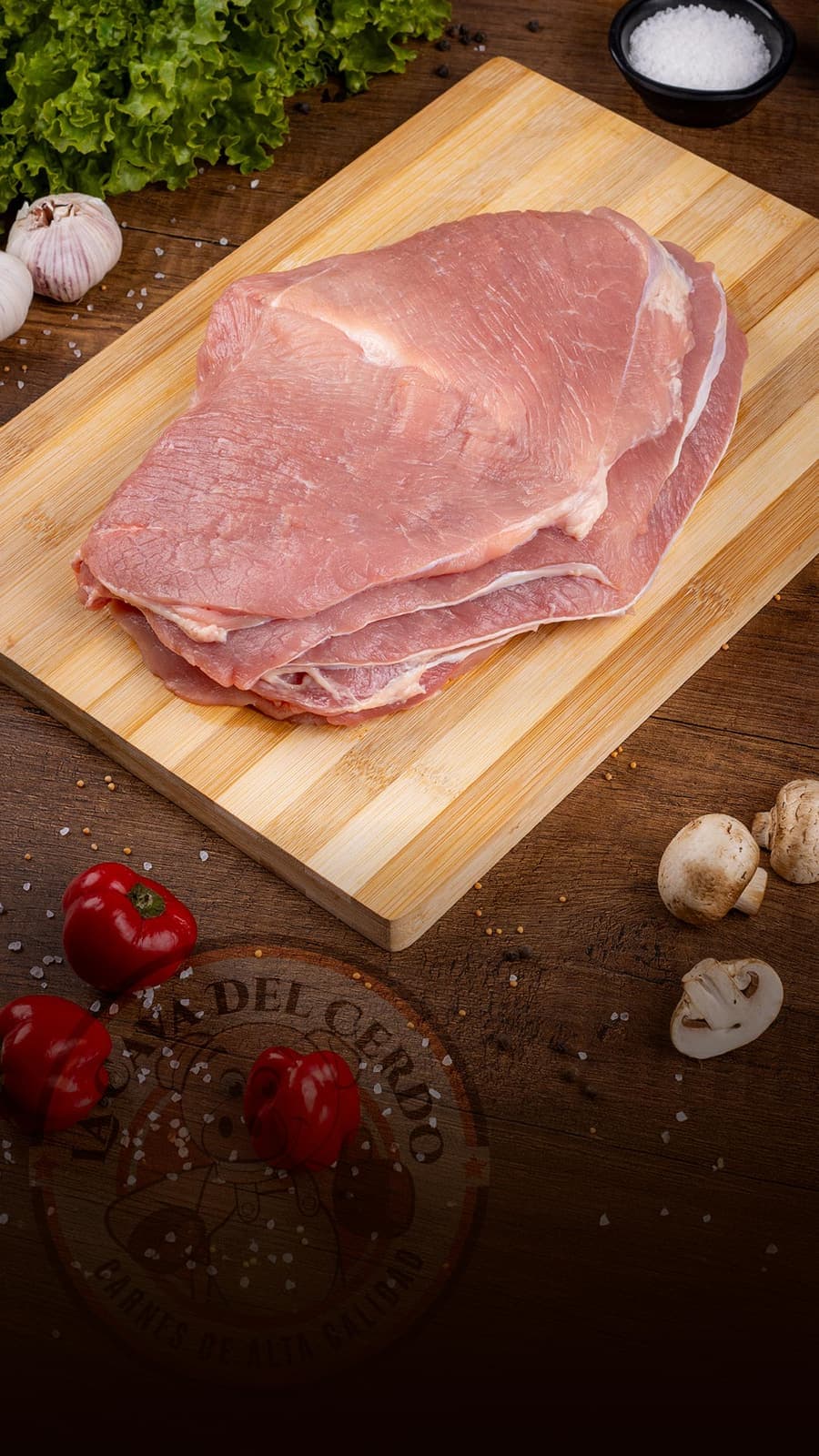 Carne Tajada de Cerdo sobre tabla de madera, La Cava del Cerdo